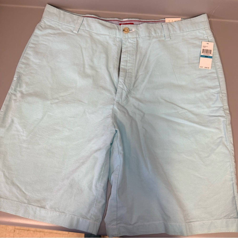 Izod Men's Flat Front light Blue Shorts Waist 36" Inseam 10”. NWT